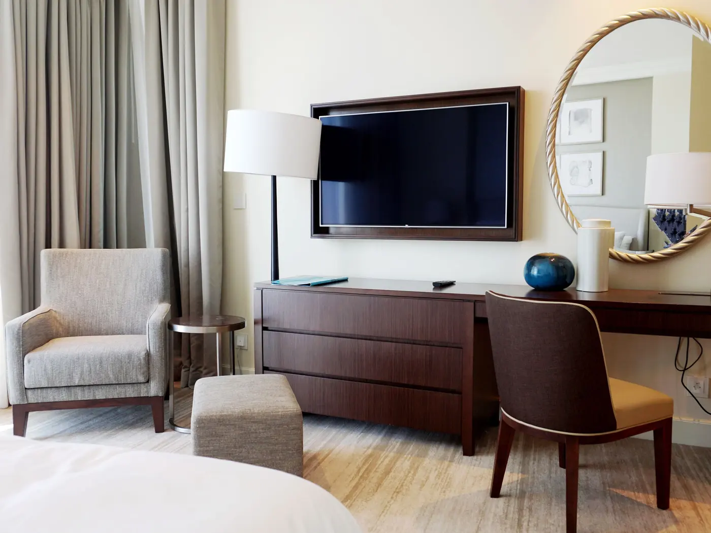 Stock photo: modern hotel guest room with a wall mounted TV
