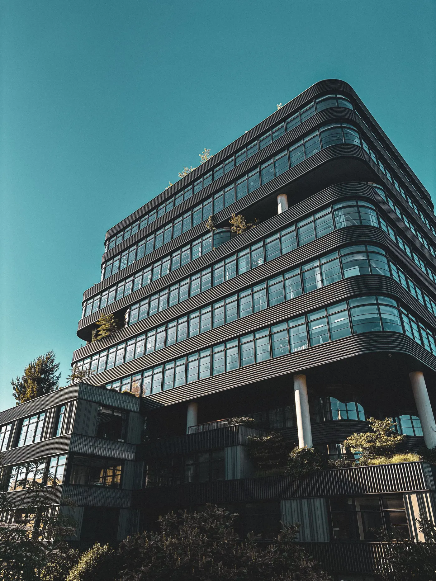 Stock photo: modern office building exterior with a glass facade