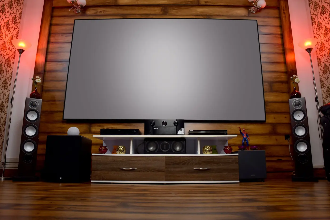Stock photo: home theater with a large projection screen and tower speakers