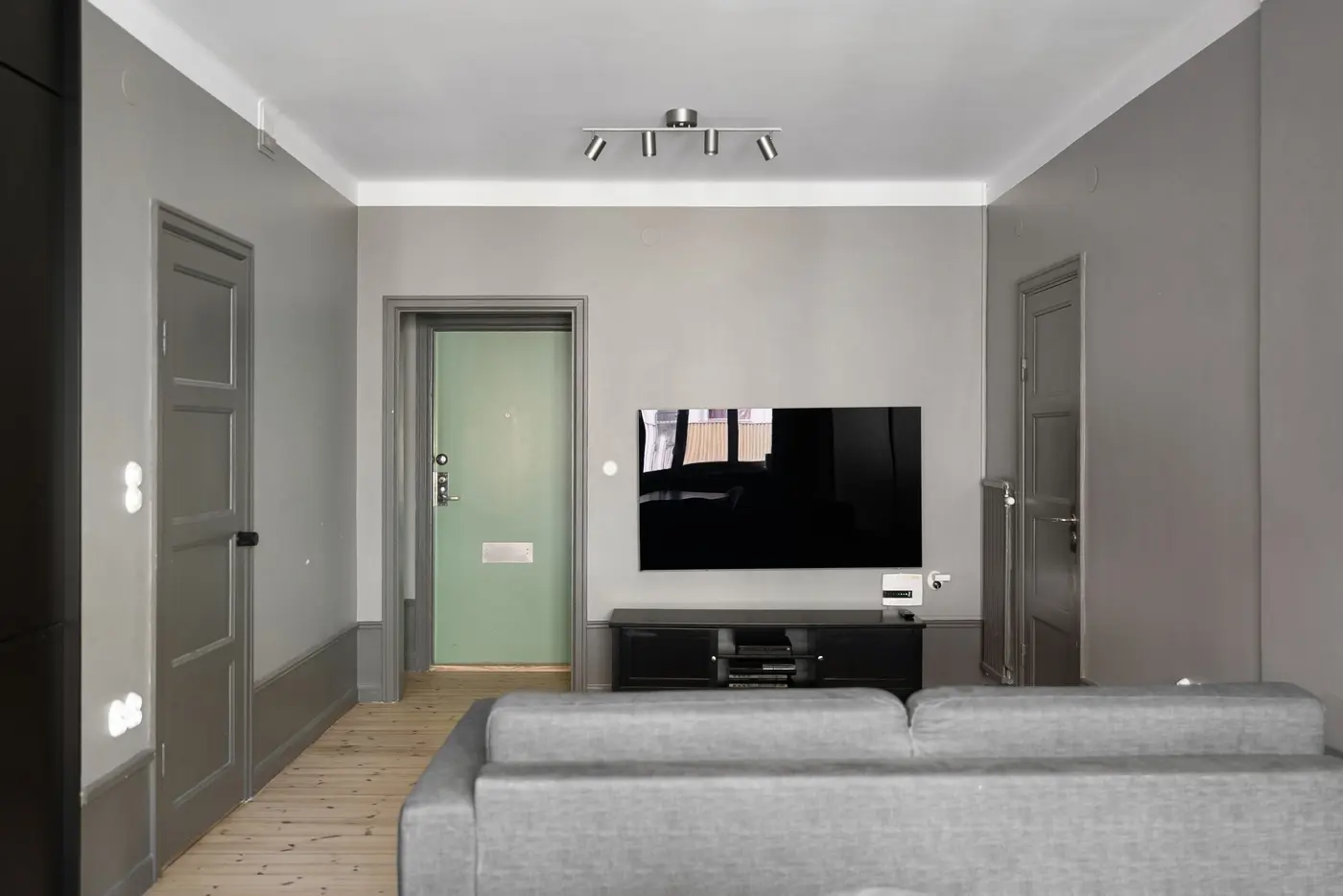 Stock photo: wall mounted TV in a minimalist living room